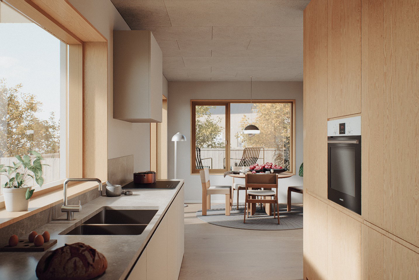 Modern wood-paneled kitchen opening into a dining area with large windows and outdoor greenery.
